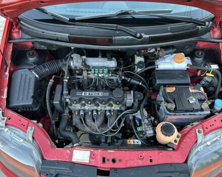 Красный Шевроле Авео, объемом двигателя 1.5 л и пробегом 191 тыс. км за 3500 $, фото 23 на Automoto.ua