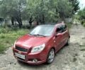 Красный Шевроле Авео, объемом двигателя 1.6 л и пробегом 124 тыс. км за 6066 $, фото 1 на Automoto.ua