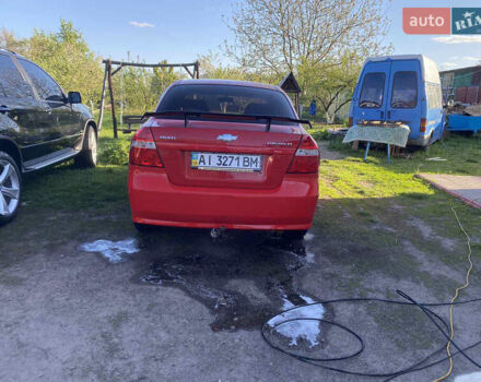 Красный Шевроле Авео, объемом двигателя 1.6 л и пробегом 148 тыс. км за 4650 $, фото 2 на Automoto.ua