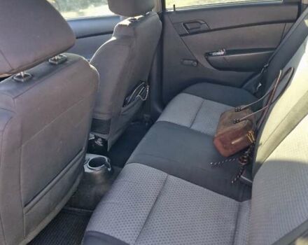 Красный Шевроле Авео, объемом двигателя 1.5 л и пробегом 150 тыс. км за 4800 $, фото 7 на Automoto.ua