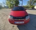 Красный Шевроле Авео, объемом двигателя 1.5 л и пробегом 240 тыс. км за 3500 $, фото 1 на Automoto.ua