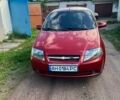 Красный Шевроле Авео, объемом двигателя 1.5 л и пробегом 260 тыс. км за 3300 $, фото 1 на Automoto.ua