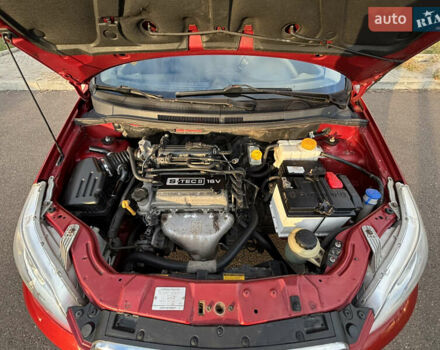 Червоний Шевроле Авео, об'ємом двигуна 1.21 л та пробігом 185 тис. км за 3700 $, фото 11 на Automoto.ua