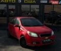 Красный Шевроле Авео, объемом двигателя 1.5 л и пробегом 157 тыс. км за 4700 $, фото 1 на Automoto.ua