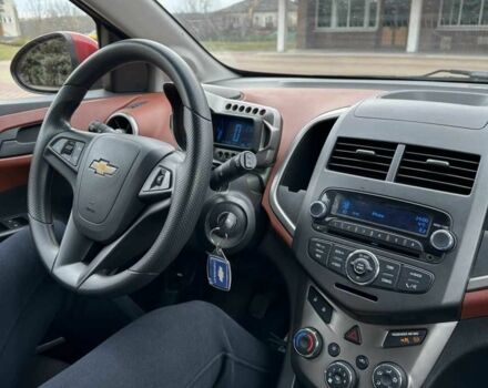 Червоний Шевроле Авео, об'ємом двигуна 1.4 л та пробігом 154 тис. км за 6200 $, фото 6 на Automoto.ua