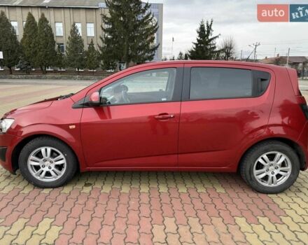 Червоний Шевроле Авео, об'ємом двигуна 1.4 л та пробігом 154 тис. км за 6200 $, фото 3 на Automoto.ua