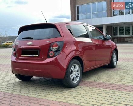 Червоний Шевроле Авео, об'ємом двигуна 1.4 л та пробігом 154 тис. км за 6200 $, фото 4 на Automoto.ua