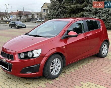 Червоний Шевроле Авео, об'ємом двигуна 1.4 л та пробігом 154 тис. км за 6200 $, фото 2 на Automoto.ua