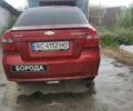Красный Шевроле Авео, объемом двигателя 1.5 л и пробегом 275 тыс. км за 3000 $, фото 1 на Automoto.ua