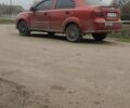 Красный Шевроле Авео, объемом двигателя 1.5 л и пробегом 275 тыс. км за 3000 $, фото 1 на Automoto.ua