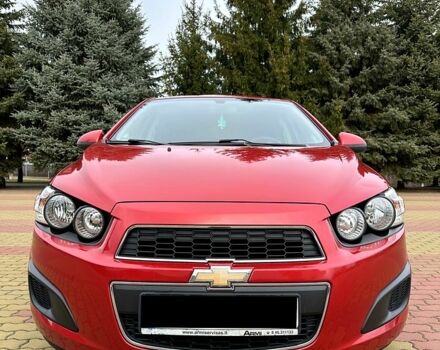 Красный Шевроле Авео, объемом двигателя 14 л и пробегом 154 тыс. км за 6799 $, фото 1 на Automoto.ua