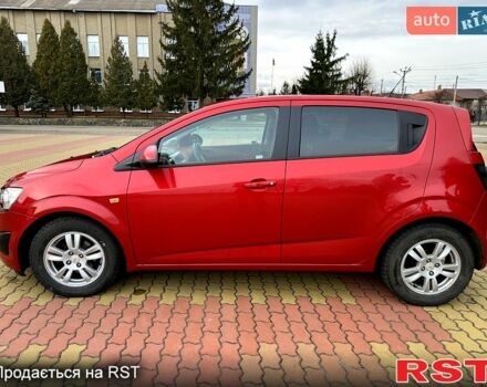 Красный Шевроле Авео, объемом двигателя 14 л и пробегом 154 тыс. км за 6799 $, фото 3 на Automoto.ua