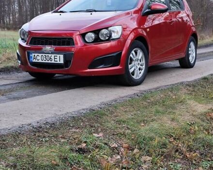 Червоний Шевроле Авео, об'ємом двигуна 1.3 л та пробігом 250 тис. км за 5999 $, фото 5 на Automoto.ua