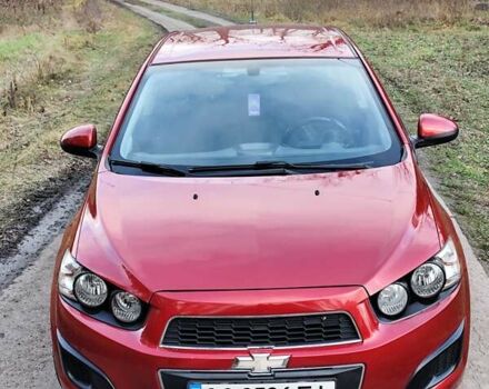 Червоний Шевроле Авео, об'ємом двигуна 1.3 л та пробігом 250 тис. км за 5999 $, фото 1 на Automoto.ua