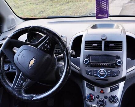 Червоний Шевроле Авео, об'ємом двигуна 1.3 л та пробігом 250 тис. км за 5999 $, фото 9 на Automoto.ua