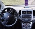 Червоний Шевроле Авео, об'ємом двигуна 1.3 л та пробігом 250 тис. км за 5999 $, фото 9 на Automoto.ua