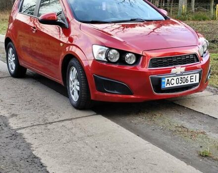 Червоний Шевроле Авео, об'ємом двигуна 1.3 л та пробігом 250 тис. км за 5999 $, фото 3 на Automoto.ua