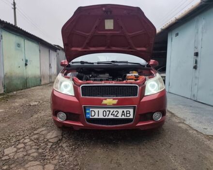 Красный Шевроле Авео, объемом двигателя 1.5 л и пробегом 125 тыс. км за 3100 $, фото 2 на Automoto.ua