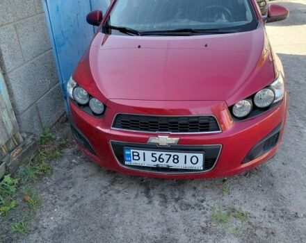 Красный Шевроле Авео, объемом двигателя 1.2 л и пробегом 165 тыс. км за 4000 $, фото 1 на Automoto.ua