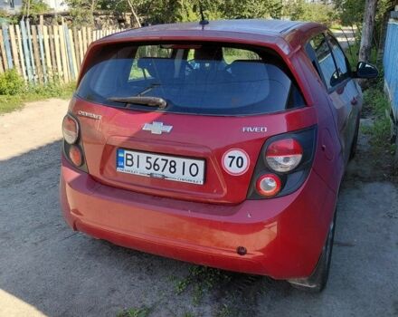 Красный Шевроле Авео, объемом двигателя 1.2 л и пробегом 165 тыс. км за 4000 $, фото 2 на Automoto.ua