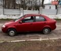 Красный Шевроле Авео, объемом двигателя 1.5 л и пробегом 300 тыс. км за 2900 $, фото 1 на Automoto.ua