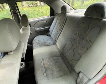 Червоний Шевроле Авео, об'ємом двигуна 1.5 л та пробігом 193 тис. км за 1850 $, фото 11 на Automoto.ua