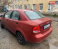 Красный Шевроле Авео, объемом двигателя 1.5 л и пробегом 250 тыс. км за 2200 $, фото 2 на Automoto.ua