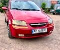 Красный Шевроле Авео, объемом двигателя 1.5 л и пробегом 390 тыс. км за 1900 $, фото 1 на Automoto.ua