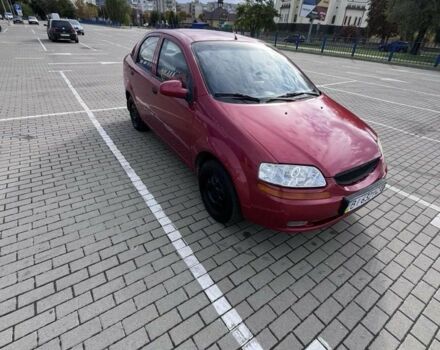 Красный Шевроле Авео, объемом двигателя 1.5 л и пробегом 200 тыс. км за 1950 $, фото 4 на Automoto.ua
