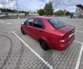Красный Шевроле Авео, объемом двигателя 1.5 л и пробегом 200 тыс. км за 1950 $, фото 1 на Automoto.ua
