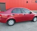 Красный Шевроле Авео, объемом двигателя 1.5 л и пробегом 150 тыс. км за 3750 $, фото 7 на Automoto.ua