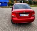 Красный Шевроле Авео, объемом двигателя 1.5 л и пробегом 203 тыс. км за 2850 $, фото 4 на Automoto.ua