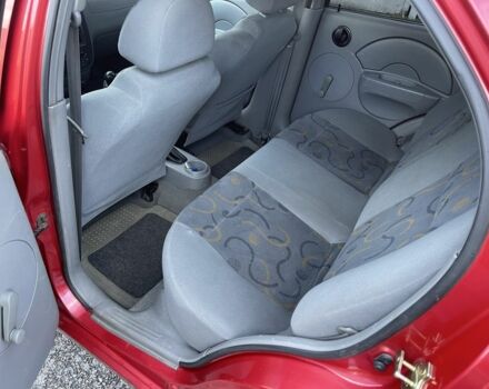 Красный Шевроле Авео, объемом двигателя 1.5 л и пробегом 150 тыс. км за 3300 $, фото 10 на Automoto.ua