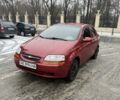 Красный Шевроле Авео, объемом двигателя 1.5 л и пробегом 175 тыс. км за 3300 $, фото 1 на Automoto.ua