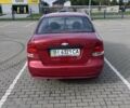 Красный Шевроле Авео, объемом двигателя 1.5 л и пробегом 200 тыс. км за 1950 $, фото 1 на Automoto.ua