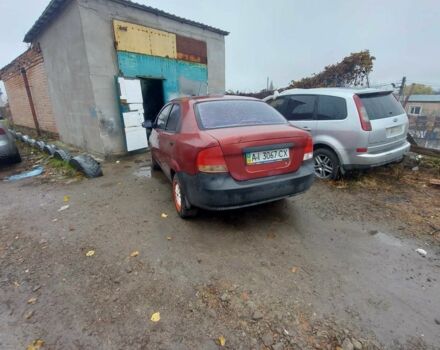 Красный Шевроле Авео, объемом двигателя 1.5 л и пробегом 200 тыс. км за 1450 $, фото 2 на Automoto.ua