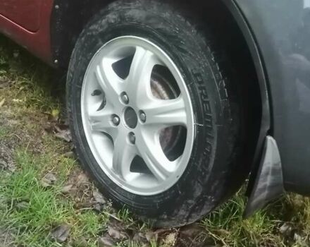 Красный Шевроле Авео, объемом двигателя 1.5 л и пробегом 250 тыс. км за 2650 $, фото 7 на Automoto.ua