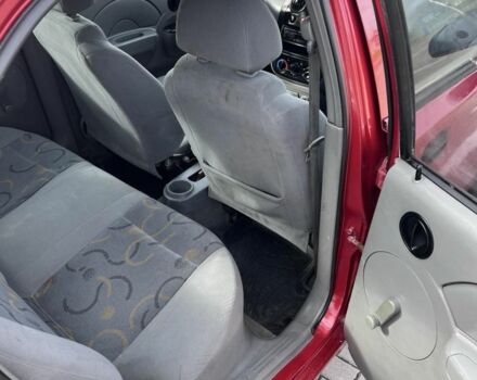 Красный Шевроле Авео, объемом двигателя 1.5 л и пробегом 200 тыс. км за 1950 $, фото 13 на Automoto.ua