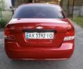 Красный Шевроле Авео, объемом двигателя 1.5 л и пробегом 248 тыс. км за 3700 $, фото 5 на Automoto.ua