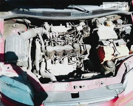 Красный Шевроле Авео, объемом двигателя 1.5 л и пробегом 215 тыс. км за 3500 $, фото 5 на Automoto.ua