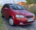 Красный Шевроле Авео, объемом двигателя 1.5 л и пробегом 150 тыс. км за 3300 $, фото 1 на Automoto.ua