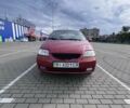 Красный Шевроле Авео, объемом двигателя 1.5 л и пробегом 200 тыс. км за 1950 $, фото 5 на Automoto.ua