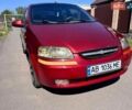 Красный Шевроле Авео, объемом двигателя 1.5 л и пробегом 390 тыс. км за 1650 $, фото 1 на Automoto.ua