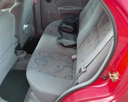 Красный Шевроле Авео, объемом двигателя 1.5 л и пробегом 150 тыс. км за 3750 $, фото 4 на Automoto.ua