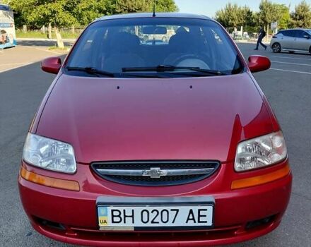 Красный Шевроле Авео, объемом двигателя 1.5 л и пробегом 150 тыс. км за 3750 $, фото 2 на Automoto.ua