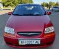 Красный Шевроле Авео, объемом двигателя 1.5 л и пробегом 150 тыс. км за 3750 $, фото 2 на Automoto.ua