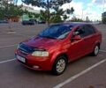 Красный Шевроле Авео, объемом двигателя 1.5 л и пробегом 320 тыс. км за 2300 $, фото 1 на Automoto.ua
