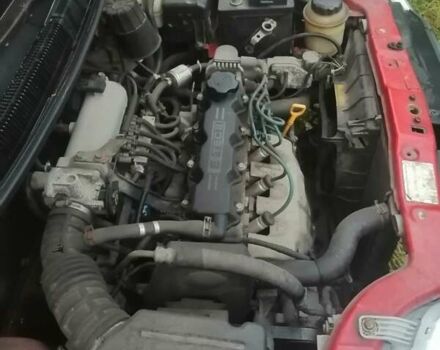 Красный Шевроле Авео, объемом двигателя 1.5 л и пробегом 250 тыс. км за 2650 $, фото 26 на Automoto.ua