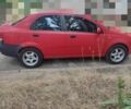 Красный Шевроле Авео, объемом двигателя 1.5 л и пробегом 374 тыс. км за 3000 $, фото 1 на Automoto.ua