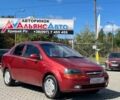 Красный Шевроле Авео, объемом двигателя 1.5 л и пробегом 313 тыс. км за 2799 $, фото 1 на Automoto.ua